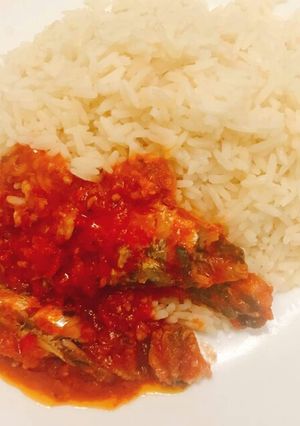 A picture of Coconut rice and sardine sauce.