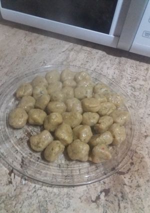 Una foto de Malfatti de zapallitos y ricota
