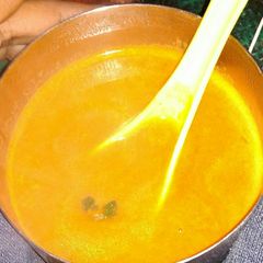 A picture of Tomato carrot soup.