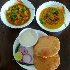 Sattu kachuri- aloo gobhi sabji A picture of Sattu kachuri- aloo gobhi sabji.