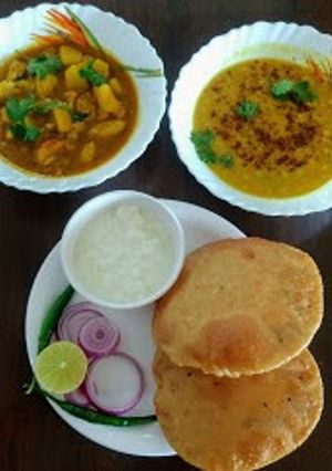 A picture of Sattu kachuri- aloo gobhi sabji.