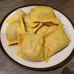 A picture of Homemade Spinach and Ricotta Ravioli.