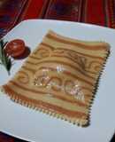 Raviolon de diseño de curry y pimiento rojo