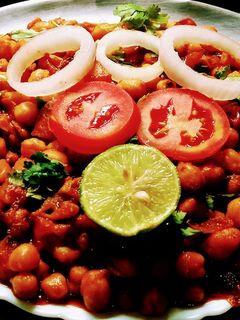 চানা মশালা(chaana masala recipe in Bengali) রেসিপির প্রধান ছবি