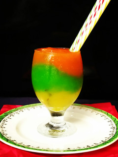 A picture of 3 Color Raw Mango Slush💛💚❤.