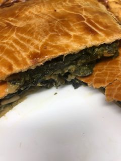 Una foto de 396. Empanada de espinacas y queso (entrante verdura)