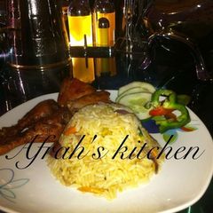 Jollof rice with fried chicken A picture of Jollof rice with fried chicken.