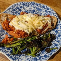 A picture of Salmon Nachos mince toast from Fridge raid leftovers.