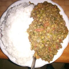 A picture of Plain rice and western ndengu stew.