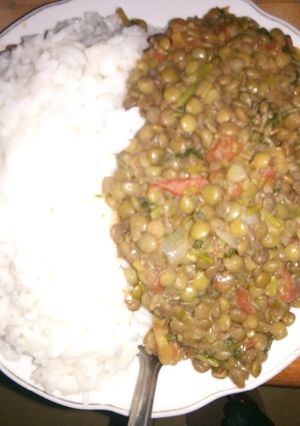 A picture of Plain rice and western ndengu stew.