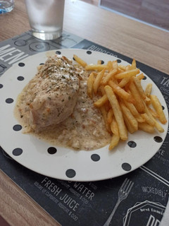 Una foto de Pechuga de pollo en salsa de puerro
