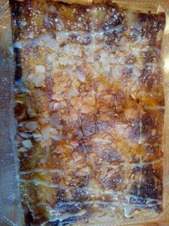Una foto de Hojaldre relleno de Nocilla, plátano y manzana