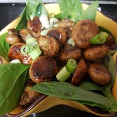 A picture of Buttered Mushrooms in a little white wine and Balsamic Vinegar.