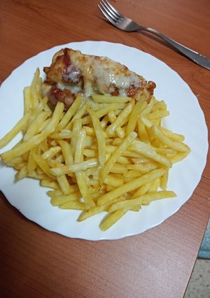 Una foto de Rollitos de pechuga rellena de jamón serrano y espárrago blanco