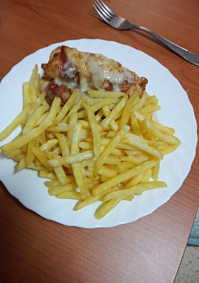 Una foto de Rollitos de pechuga rellena de jamón serrano y espárrago blanco