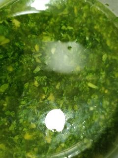 Una foto de Aceite de ajo y perejil