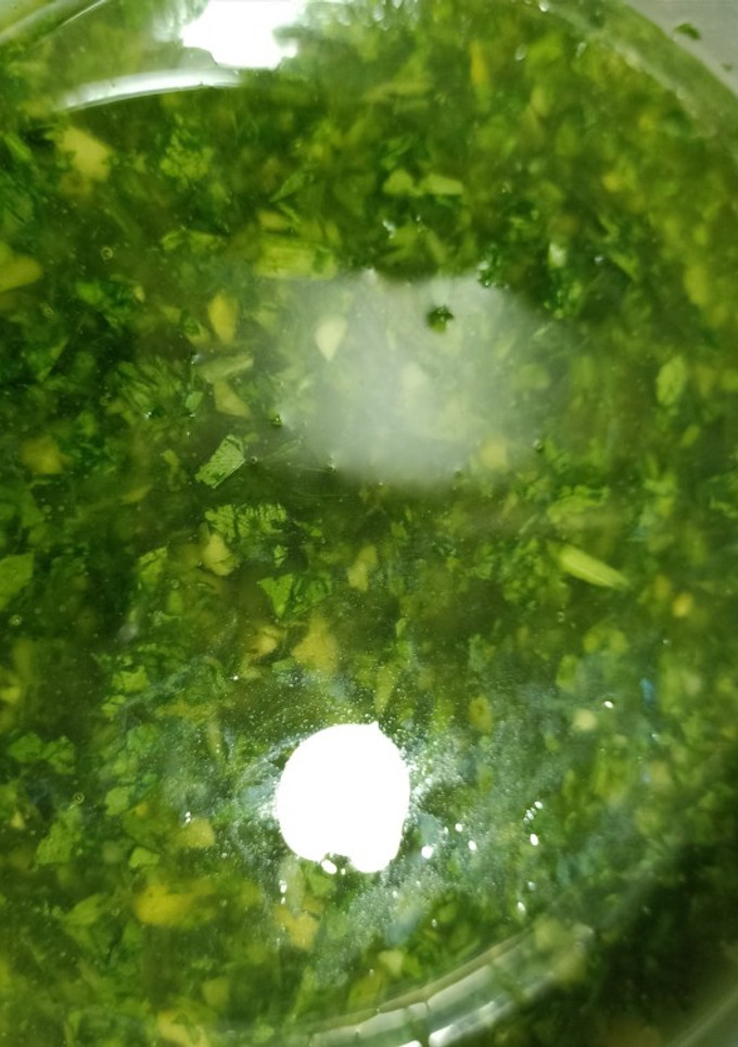 Una foto de Aceite de ajo y perejil