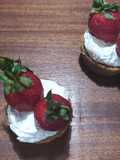 Mini Tarts with Ganache, Whipped Cream, and Strawberries
