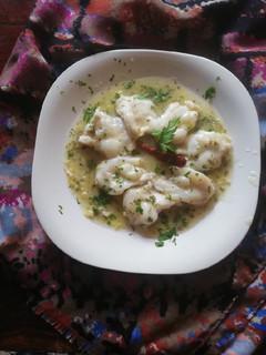 Una foto de Kokotxas de Bacalao en salsa verde