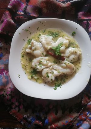 Una foto de Kokotxas de Bacalao en salsa verde