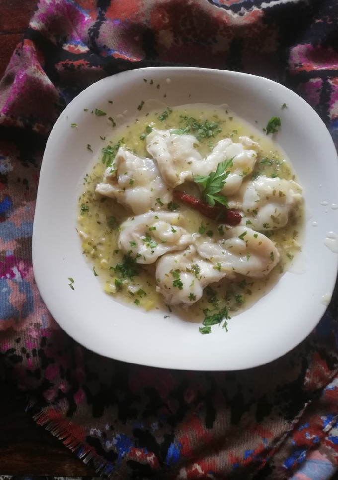 Una foto de Kokotxas de Bacalao en salsa verde