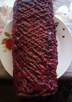O poză a rețetei Ruladă de cacao cu cremă de ciocolată și mure.