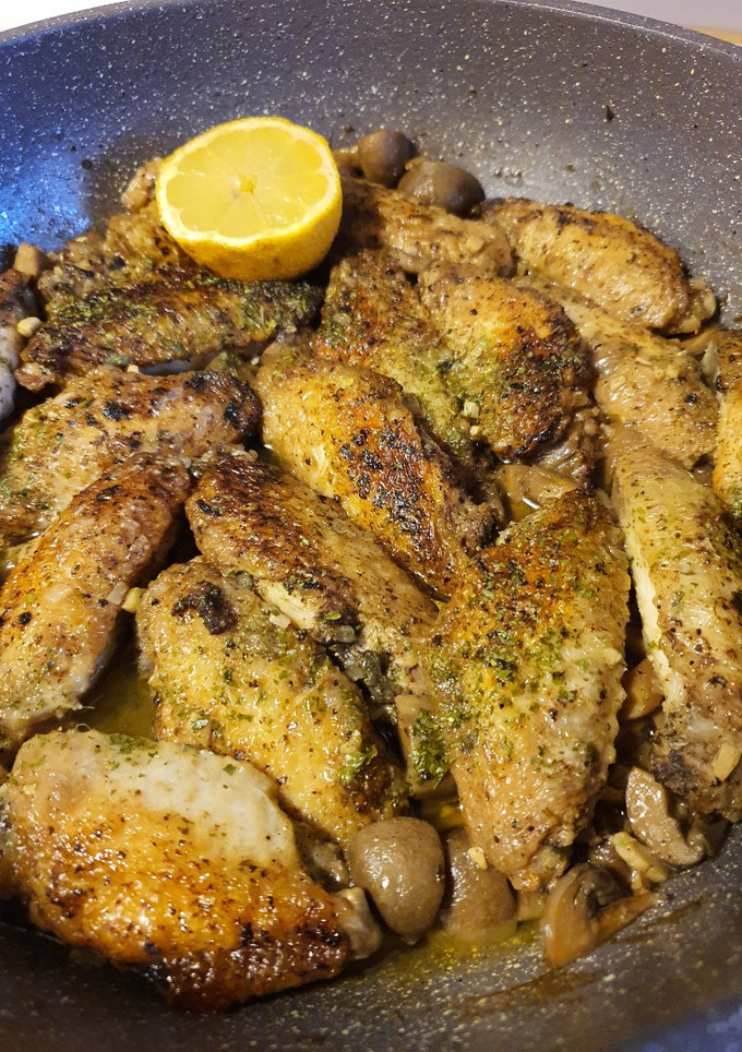 Una foto de Alitas al ajillo de Luisa