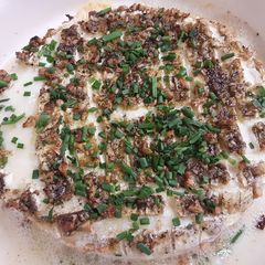 A picture of Savory Garlic and Herb Baked Brie.
