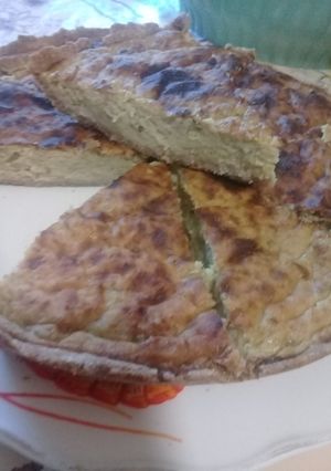 Una foto de Tarta de cebolla, puerro y queso