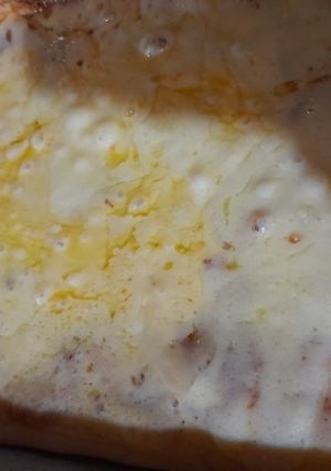 Una foto de Pizza con harina leudante. (Pizza casera sin levadura)