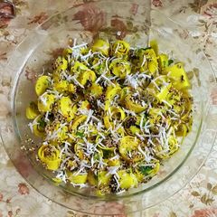 A picture of Fhesh coconut patudi (khandavi).