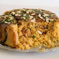 A picture of Maqluba (upside-down rice dish) (Jordan).