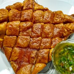 A picture of Crispy pork belly with chimichurri.