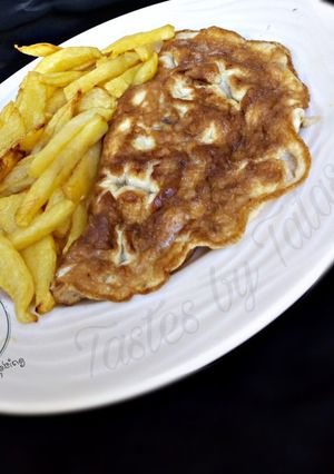 A picture of Chips and omelette.