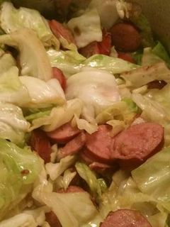 A picture of Polish Kielbasa and Cabbage.