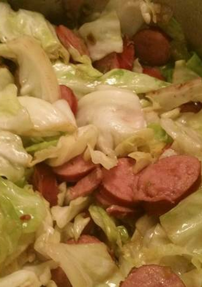 A picture of Polish Kielbasa and Cabbage.