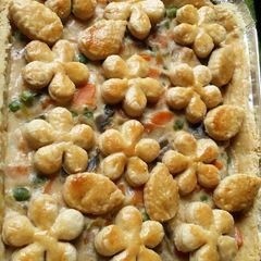 A picture of Creamy chicken and vegetable family pie.