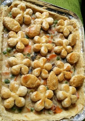 A picture of Creamy chicken and vegetable family pie.