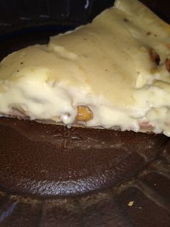 Una foto de Tarta de pollo con salsa blanca