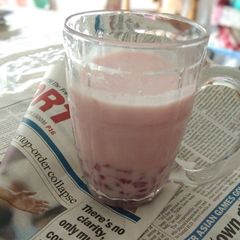 A picture of Apple Rose milk with pomegranate.