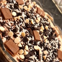 A picture of 3 colors Chocolate Dessert.