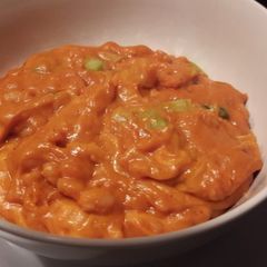 A picture of Cheesy curried baked beans.