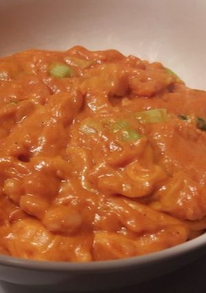 A picture of Cheesy curried baked beans.
