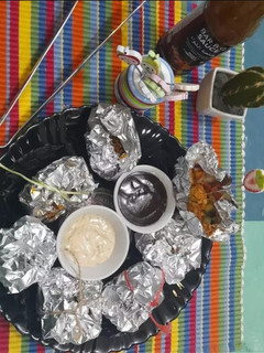 A picture of Foil chicken with veggies.