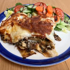 A picture of Lentil, spinach & mushroom veggie lasagne.