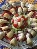 Salade de coeurs d'artichauts aux tomates, concombre et fleurs de thym