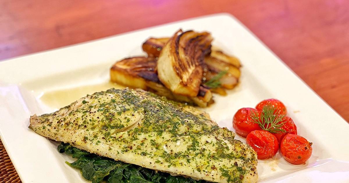 Herb Baked Sea bass, Caramelised Fennel, Baby Tomatoes and Spinach