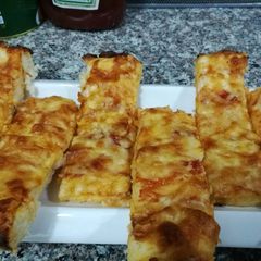 A picture of Bread pizza slice.