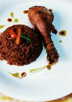 A picture of Browned Rice with Spicy fried chicken.