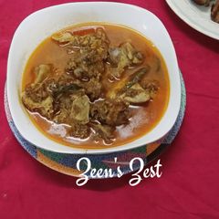 A picture of Hyderabadi Goat Head Curry.